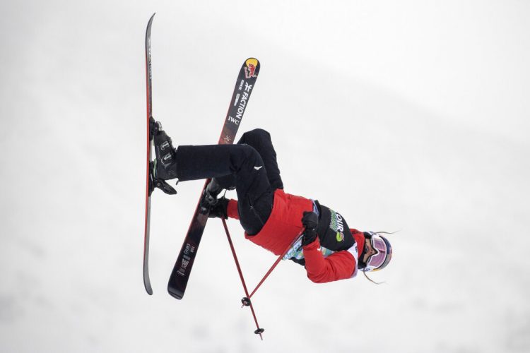 Olympics a sweet, complex homecoming for Chinese diaspora